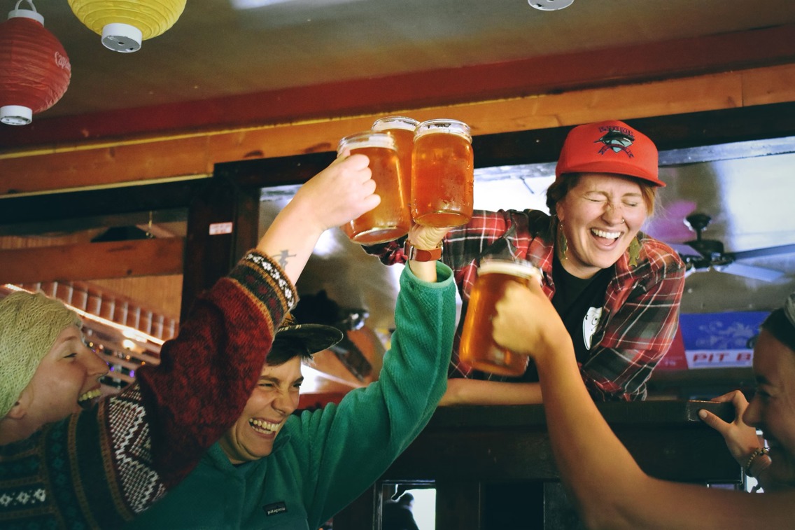 People cheering with beer.