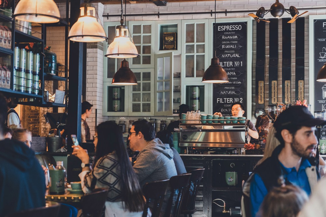 People in a busy coffee shop