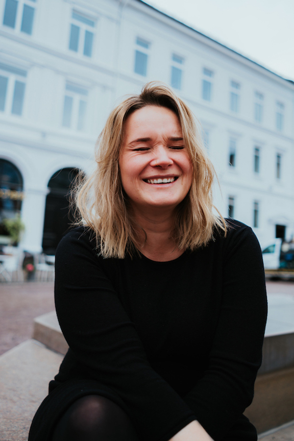 Susann smiles and laughs in the center of Oslo
