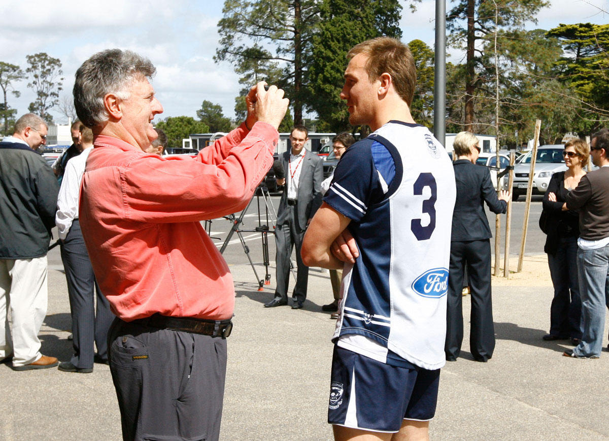 Mobile journalist interviewing a player.