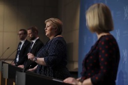 Previous prime minister of Norway, Erna Solberg, under a press conference during covid