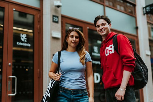 Two students outside campus