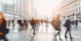 People moving fast paced in a city