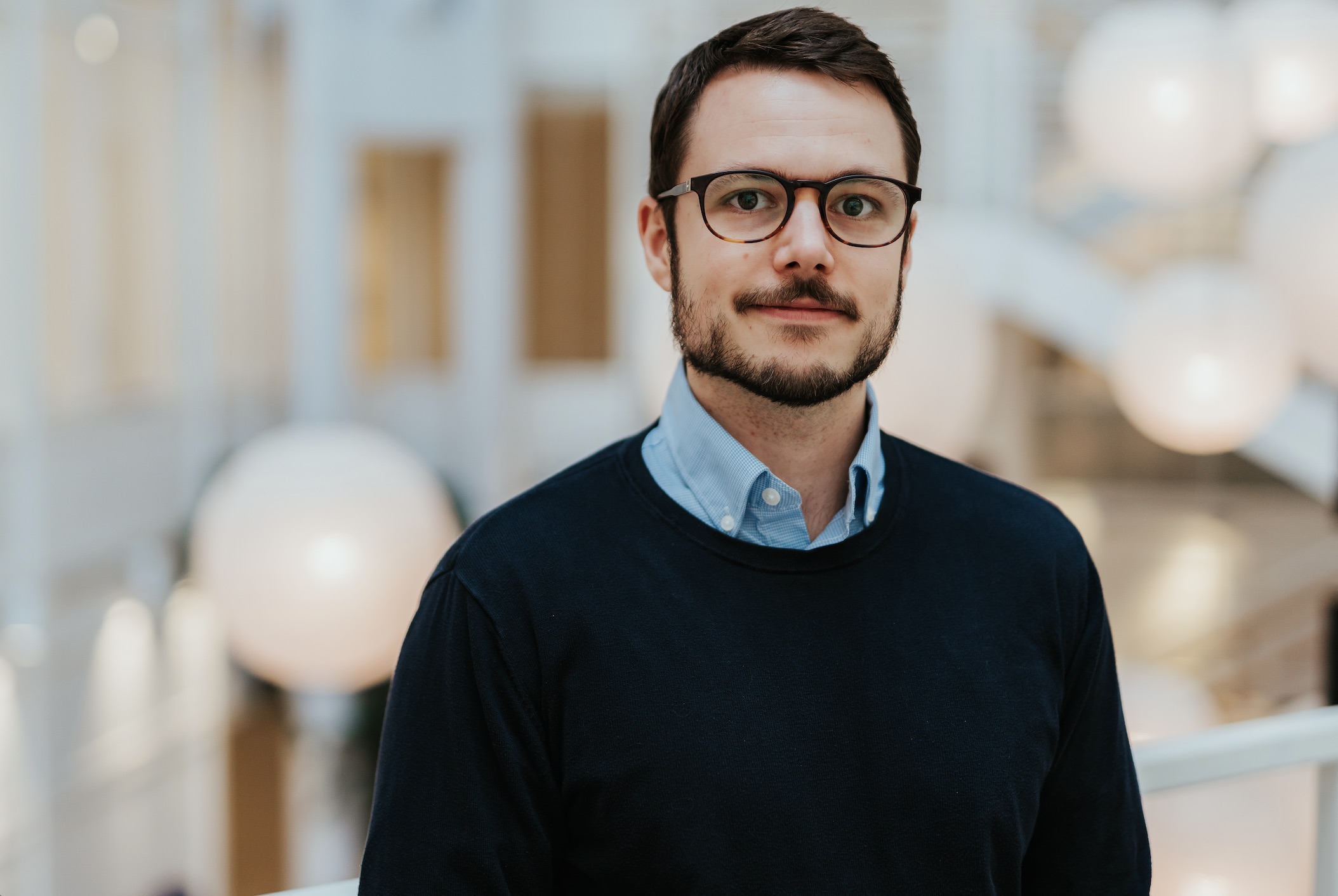 Portrettbilde av Anders Skretting tatt i Kristianias undervisningsbygg i Prinsens Gate