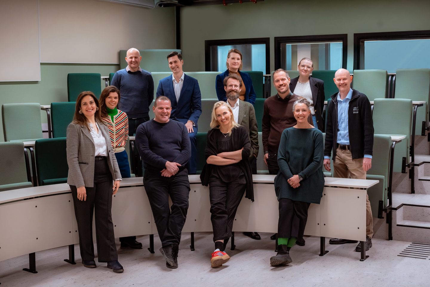 Group photo of the KAI centre team in a Kristiania Harvard-room