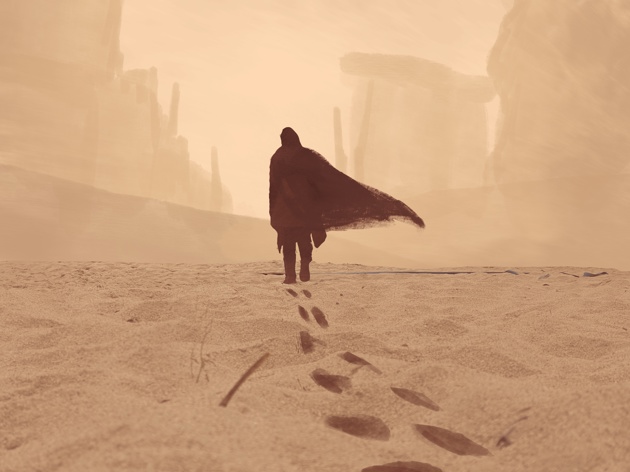 Person som går alene i ørkenen